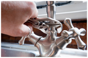 Euless plumber installs a faucet